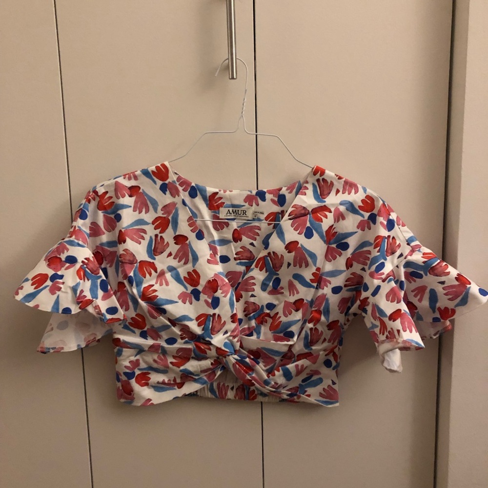 AMUR flutter sleeve crop top. Blue white and pink floral print.